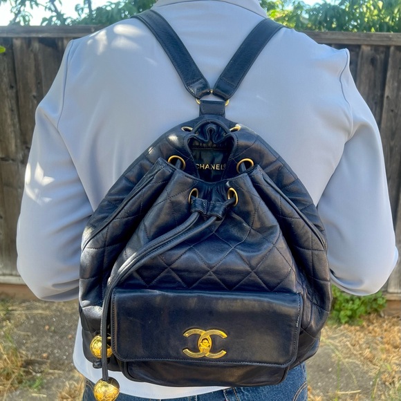 CHANEL Handbags - Chanel Quilted Lambskin Navy with 24k gold plated hardware drawstring Backpack
